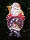 Vintage Santa Claus with snow globe tummy