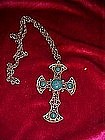 Large silver tone cross with faux turquoise pendant