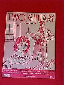 Two guitars, sheet music with Russian & English text