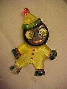 Bakelite googley eyed black clown pin