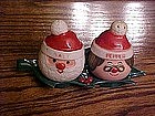 Mr and Mrs. Claus salt and pepper shakers on tray