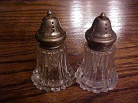 Fancy glass salt and pepper shakers, with plated tops