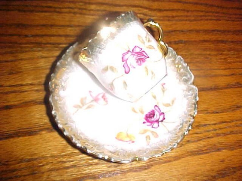 Antique Dresden demitasse cup and saucer, roses