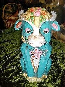 Retro 1960's flower power, turquoise bull bank