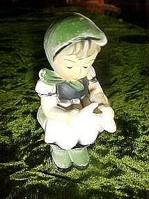 Plastic hummel look alike figurine with scissors