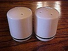 Stoneware shakers with navy blue band trim