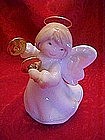 Angel figurine playing musical instrument, wire halo
