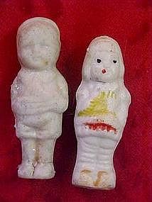 Pair of old bisque figurines, tiny boy and girl