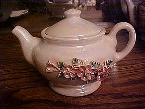 Ceramic lustre teapot with applied flowers