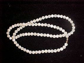Solid mother of pearl strand of beads