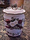 Pretty Holiday cookie jar with ribbons and pinecones