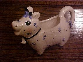 Josef Originals cow creamer ,with calico flowers