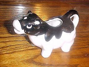 Black and white cow cream pitcher