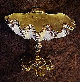 Elegant vintage shell dish on ornate pedistal