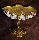 Elegant vintage shell dish on ornate pedistal