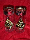 Large glass salt and pepper shakers with Christmas tree