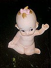 Kelvins bisque baby figurine, kewpie-like