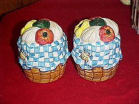 Basket of garden vegetables, salt and pepper shakers