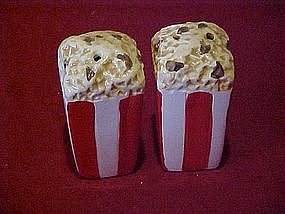 Bags of popcorn, salt and pepper shakers