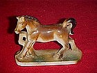 Old brown porcelain horse figurine