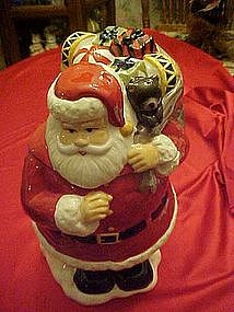 Santa Claus with bag of toys, cookie jar