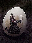 Collectible porcelain egg with romantic clown