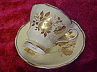 Royal Grafton cup and saucer, yellow, with gold roses