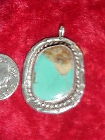 Handcrafted vintage turquoise and silver pendant
