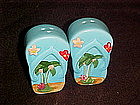 Beach and palm trees  salt and pepper shakers