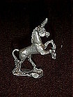 Miniature pewter unicorn figurine