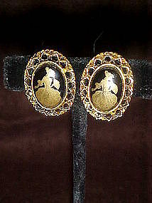 Vintage clip earrings with southern belle center