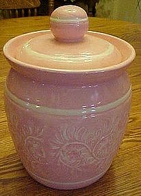 Pink and white glazed ceramic cookie jar