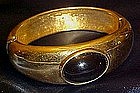 Vintage gold tone Monet hinged bracelet