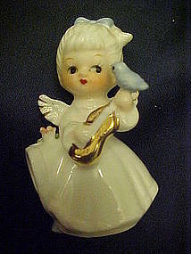 Tiny bone china angel with bluebird