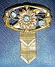 Vintage Harry Isken pin with mesh ribbons and stones
