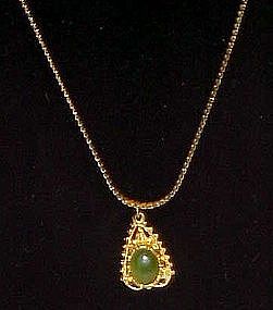 Jade  and gold tone necklace