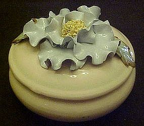 Vintage ceramic powder jar with blue flower top
