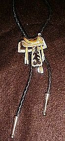 Nice western saddle bolo tie w/leather braid