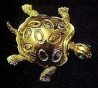 Gold tone turtle tortoise pin with rhinestone eyes