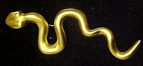 Large gold satin finish snake pin, Clara 1982