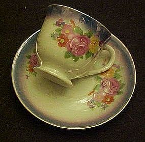 Occupied Japan lustre and roses demi cup and saucer