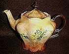 Hand painted porcelain teapotyellow flowers and vines