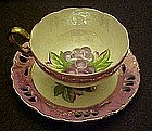 Vintage Enesco lustre, three legs cup and saucer set