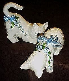 Playful  pair of ceramic kitties with blue floral