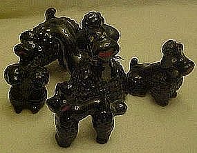 Black glaze poodle figurines family, red clay