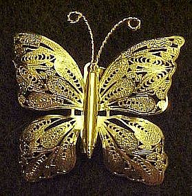 Goldtone butterfly pin with delicate filigree