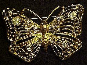 Gold filigree butterfly pin with rhinestone accents