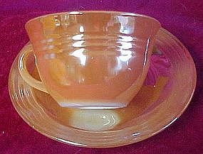 Fire king peach lustre, three bands cup and saucer