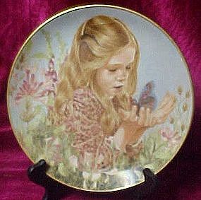 Catching a butterfly plate by Liz moyes, danbury Mint