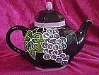 Hand painted ceramic teapot, black with fruits